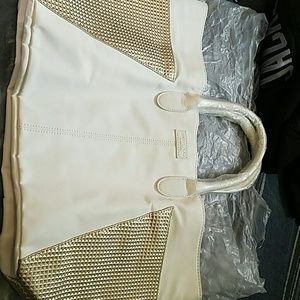 A white Jimmy Choo perfume bag